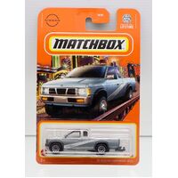 MATCHBOX 95 NISSAN HARDBODY  D21 GREY 15/100 METAL DIECAST CAR LONGCARD