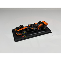 BBURAGO 18-38215 F1 WITH HELMET 2024 F-1 MCLAREN MCL38 #81 PIASTRI WITH HELMET 1:43 SCALE COLLECTOR VEHICLE IN DISPLAY BOX